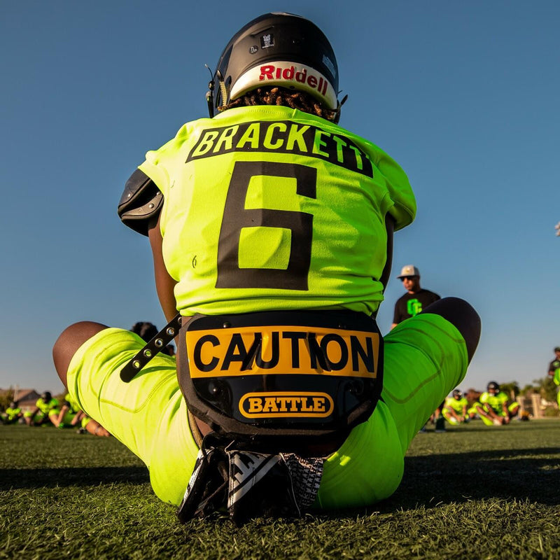 Caution Football Back Plate by Battle Sports